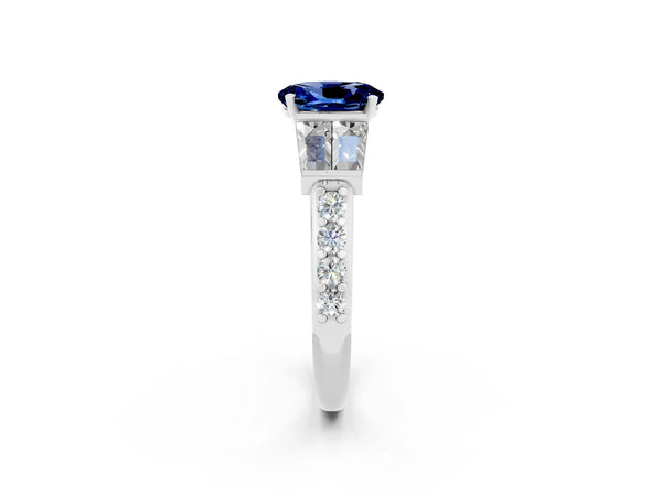 Platinum Oval Cut Blue Sapphire Engagement Ring with Baguette Side Stones and Channel Set Band