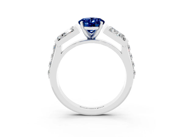 Platinum Oval Cut Blue Sapphire Engagement Ring with Baguette Side Stones and Channel Set Band