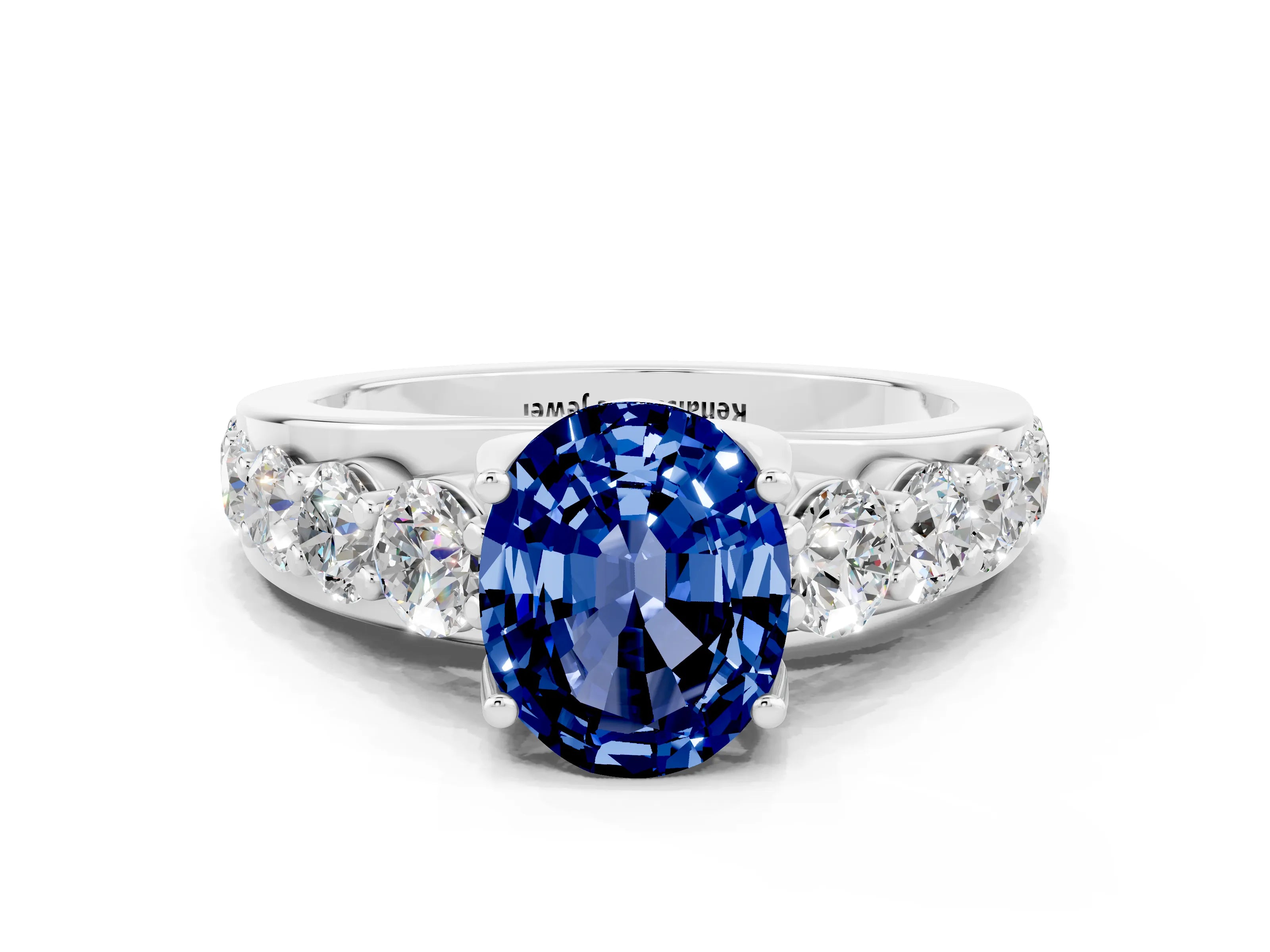 White gold Oval Cut Blue Sapphire Engagement Ring with Pavé Band and Four-Prong Setting