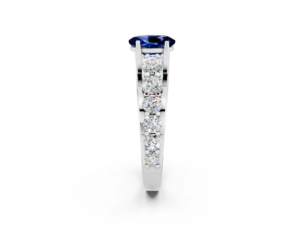 Platinum Oval Cut Blue Sapphire Engagement Ring with Pavé Band and Four-Prong Setting