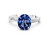 White gold Oval Cut Blue Sapphire Engagement Ring with Side Stone Accents and Four-Prong Setting_36