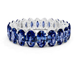 White gold Oval Cut Blue Sapphire Eternity Band with Shared Prong Setting