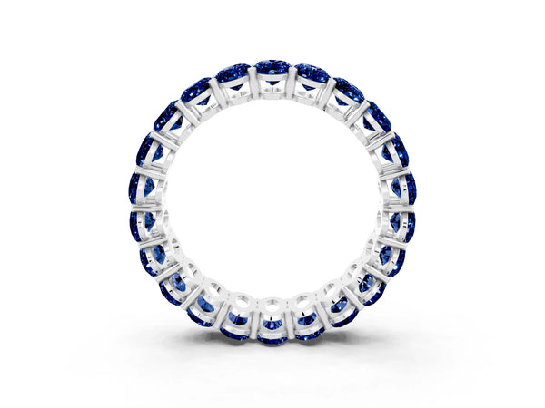 White gold Oval Cut Blue Sapphire Eternity Band with Shared Prong Setting