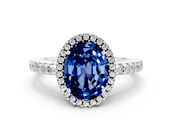 Silver Oval Cut Blue Sapphire Halo Engagement Ring with Pavé Band and Prong Setting