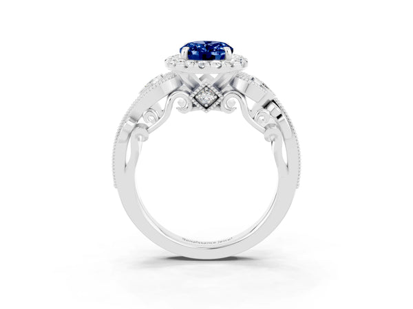 Platinum Oval Cut Blue Sapphire Halo Ring with Milgrain Pavé Band and Four-Prong Setting