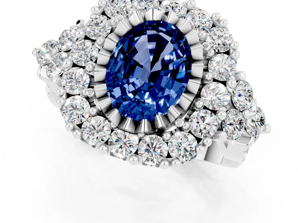 Silver Oval Cut Blue Sapphire Halo Ring with Pavé Band and Four-Prong Setting