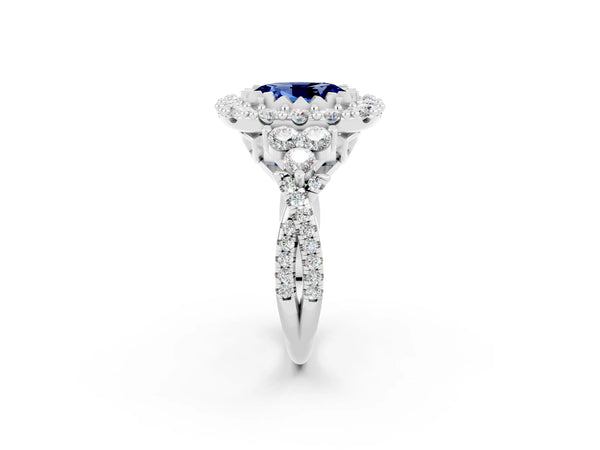 Platinum Oval Cut Blue Sapphire Halo Ring with Pavé Band and Four-Prong Setting