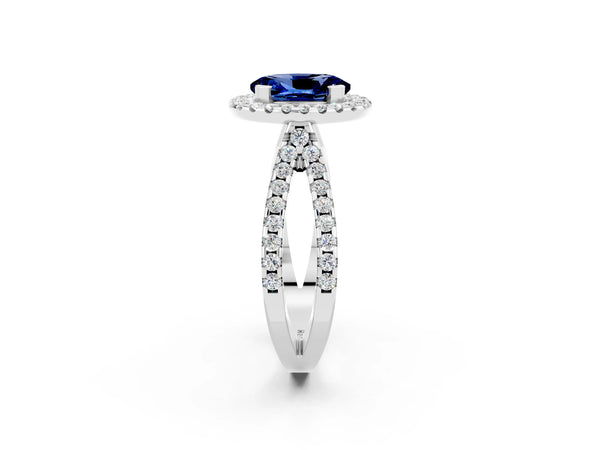Silver Oval Cut Blue Sapphire Halo Ring with Split Shank Pavé Band and Prong Setting
