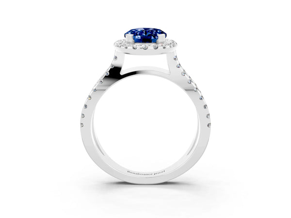 Silver Oval Cut Blue Sapphire Halo Ring with Split Shank Pavé Band and Prong Setting