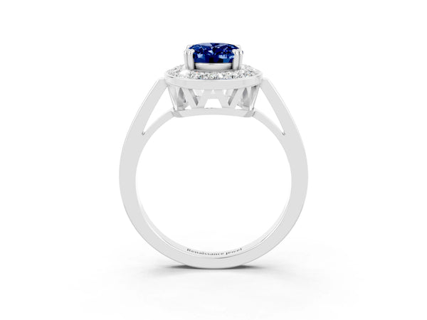 Platinum Oval Cut Blue Sapphire Halo Ring with Split Shank and Four-Prong Setting