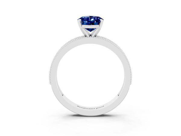 Platinum Oval Cut Blue Sapphire Milgrain Pavé Engagement Ring with Four-Prong Setting
