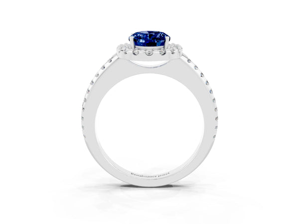 Platinum Oval Cut Blue Sapphire Pavé Halo Ring with Four-Prong Setting