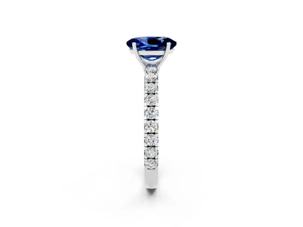 Silver Oval Cut Blue Sapphire Pavé Solitaire Engagement Ring with Four-Prong Setting