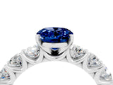 White gold Oval Cut Blue Sapphire Prong Setting with Side Stones on a Pave Band_4
