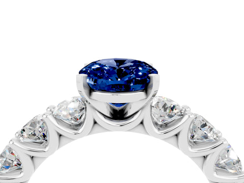 White gold Oval Cut Blue Sapphire Prong Setting with Side Stones on a Pave Band_4
