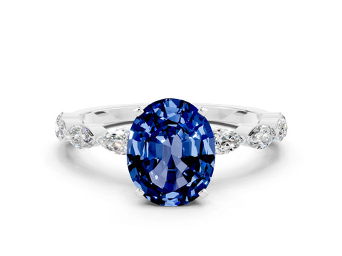 White gold Oval Cut Blue Sapphire Ring with Marquise Side Stones and Prong Setting