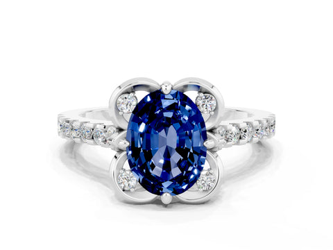 White gold Oval Cut Blue Sapphire Ring with Pavé Band and Floral Prong Setting