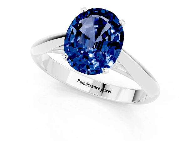 Silver Oval Cut Blue Sapphire Solitaire Engagement Ring with Cathedral Setting and Four-Prong Mount