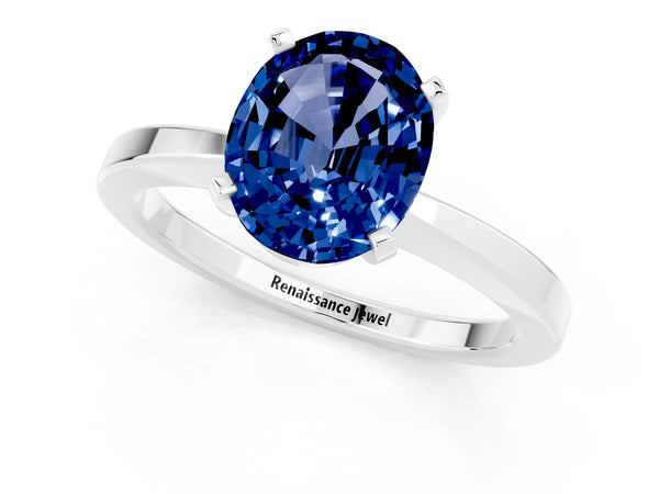 Silver Oval Cut Blue Sapphire Solitaire Engagement Ring with Classic Band and Four-Prong Setting