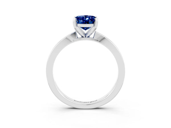 Platinum Oval Cut Blue Sapphire Solitaire Engagement Ring with Classic Band and Four-Prong Setting