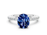 White gold Oval Cut Blue Sapphire Solitaire Engagement Ring with Pavé Band and Four-Prong Setting_23