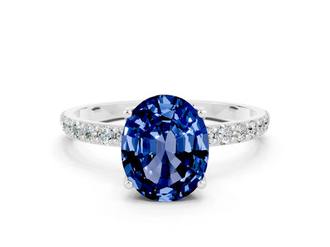 White gold Oval Cut Blue Sapphire Solitaire Engagement Ring with Pavé Band and Prong Setting
