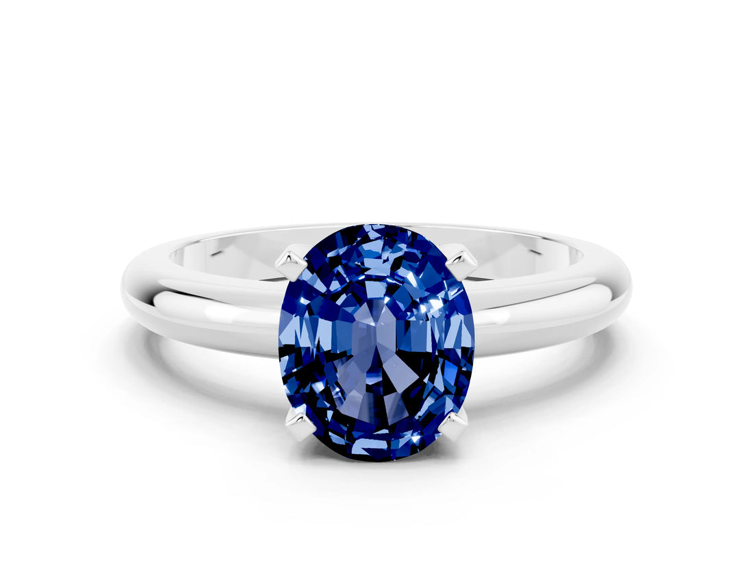 White gold Oval Cut Blue Sapphire Solitaire Engagement Ring with Round Band and Four-Prong Setting