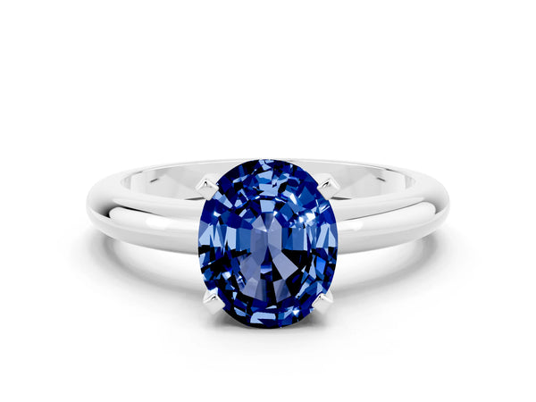 Silver Oval Cut Blue Sapphire Solitaire Engagement Ring with Round Band and Four-Prong Setting
