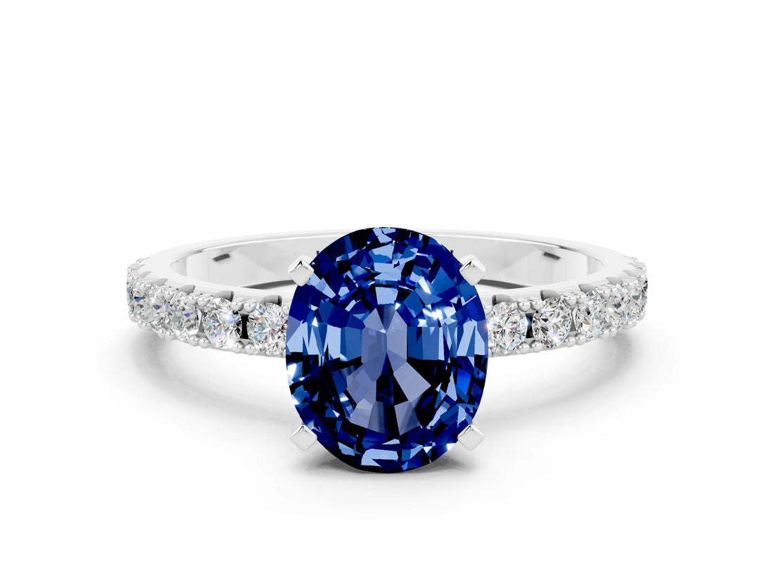 White gold Oval Cut Blue Sapphire Solitaire Pavé Band with Four-Prong Setting