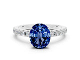 White gold Oval Cut Blue Sapphire Solitaire Pavé Band with Four-Prong Setting