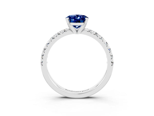 Platinum Oval Cut Blue Sapphire Solitaire Pavé Engagement Ring with Round Band and Prong Setting