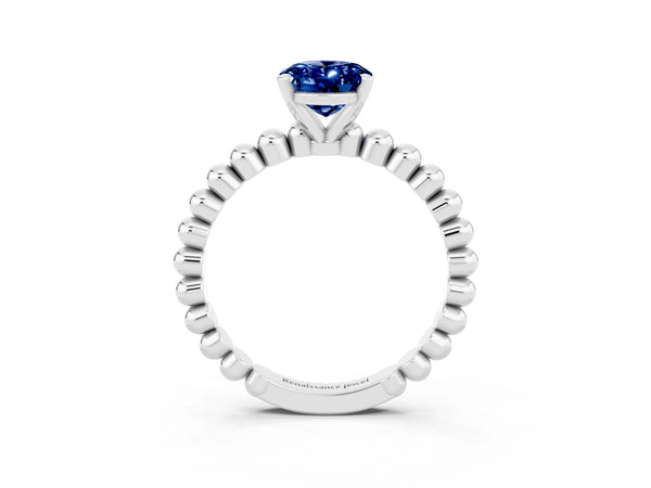 Platinum Oval Cut Blue Sapphire Solitaire Ring with Beaded Band and Prong Setting