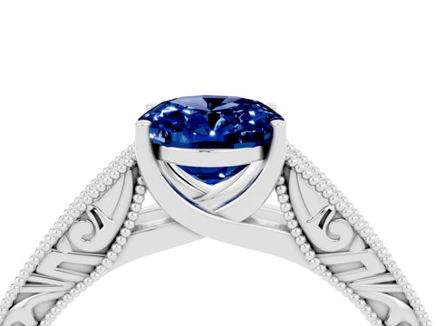 White gold Oval Cut Blue Sapphire Solitaire Ring with Engraved Band and Four-Prong Setting_4