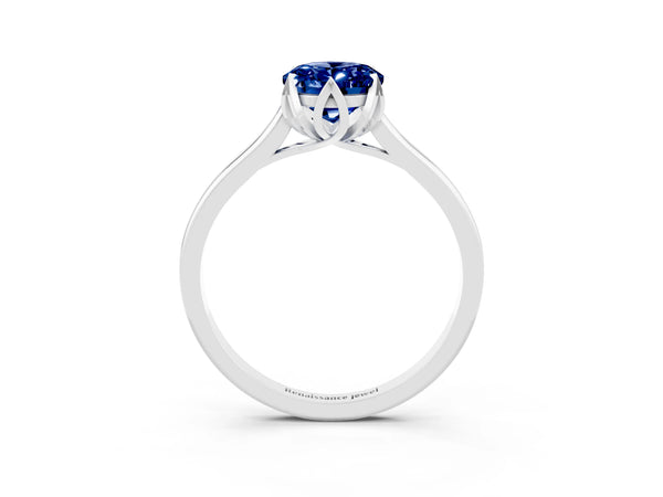 Silver Oval Cut Blue Sapphire Solitaire Ring with Flower Prong Setting and Classic Band