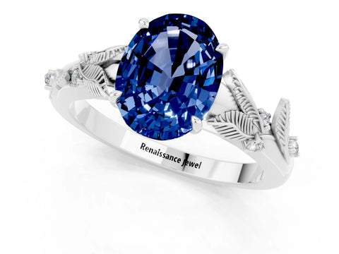 White gold Oval Cut Blue Sapphire Solitaire Ring with Leaf Motif Band and Four-Prong Setting_1