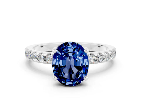White gold Oval Cut Blue Sapphire Solitaire Ring with Pavé Band and Four-Prong Setting_24