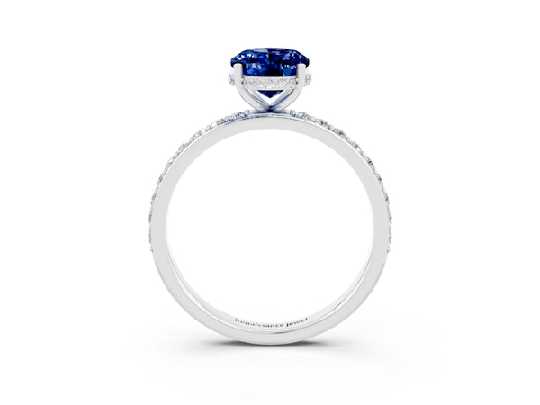 Silver Oval Cut Blue Sapphire Solitaire Ring with Pavé Band and Hidden Halo