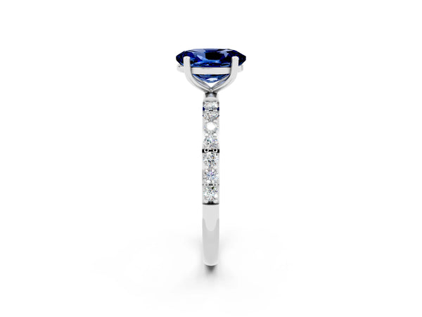 Platinum Oval Cut Blue Sapphire Solitaire Ring with Round  Pavé Band and Prong Setting