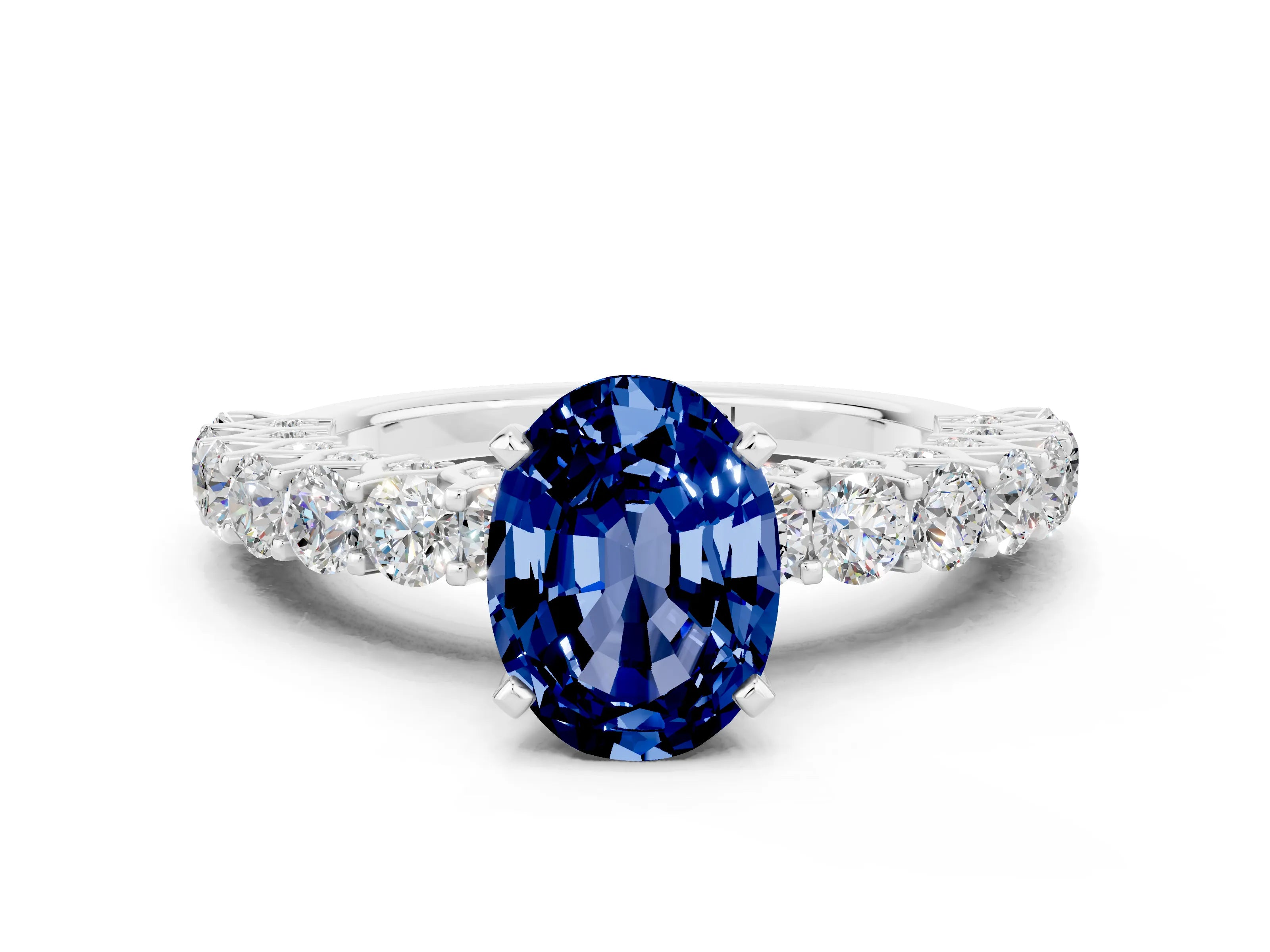 White gold Oval Cut Blue Sapphire Solitaire Ring with Shared Prong Pavé Band and Four-Prong Setting