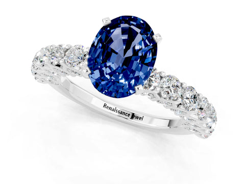 White gold Oval Cut Blue Sapphire Solitaire Ring with Shared Prong Pavé Band and Four-Prong Setting_1