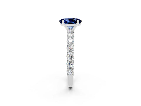 White gold Oval Cut Blue Sapphire Solitaire Ring with Shared Prong Pavé Band and Four-Prong Setting_2