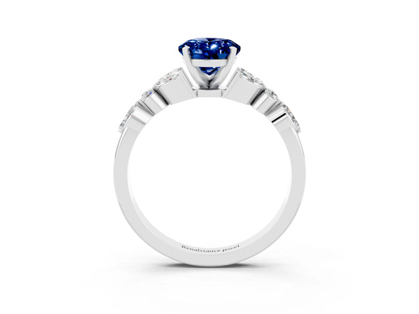 Silver Oval Cut Blue Sapphire Solitaire Ring with Side Stones and Four-Prong Setting