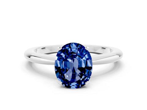 White gold Oval Cut Blue Sapphire Solitaire Ring with Six-Prong Setting and Classic Band