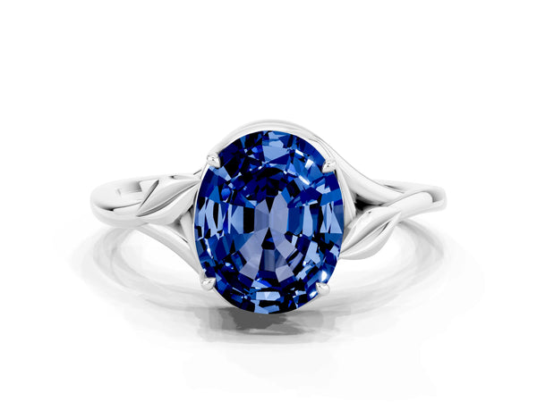 Platinum Oval Cut Blue Sapphire Solitaire Ring with Twist Band and Four-Prong Setting