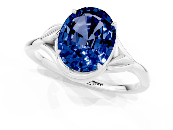 Silver Oval Cut Blue Sapphire Solitaire Ring with Twist Band and Four-Prong Setting