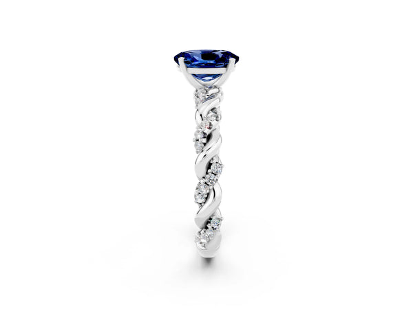 White gold Oval Cut Blue Sapphire Solitaire Ring with Twisted Band and Pavé Accents