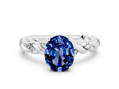 White gold Oval Cut Blue Sapphire Solitaire Ring with Twisted Band and Pavé Accents