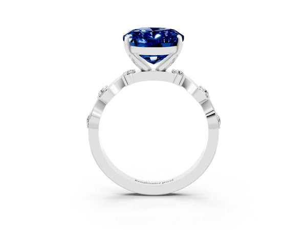 Platinum Oval Cut Blue Sapphire Solitaire Twisted Band with Round  Accents and Prong Setting