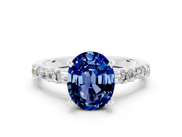 Platinum Oval Cut Blue Sapphire Solitaire with Side Baguettes and Channel Set Band