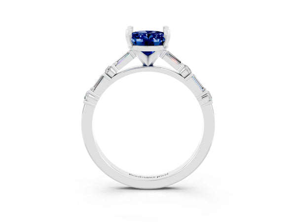 White gold Oval Cut Blue Sapphire Solitaire with Side Baguettes and Channel Set Band